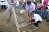 Misionera Dominica colocando la primera piedra